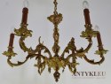 Rasowy żyrandol barokowy z mosiądzu. Antyczne oświetlenie do pałacu.
