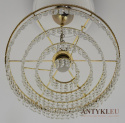 Retro żyrandol kryształowy okrągły. Oświetlenie vintage.