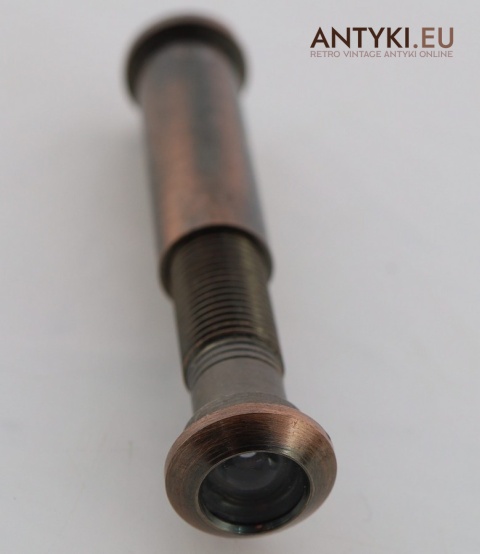 stara kołatka drzwiowa z judaszem