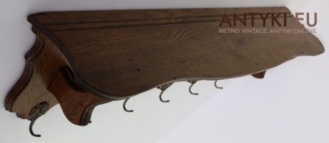 rzeźbiony wieszak artystyczny