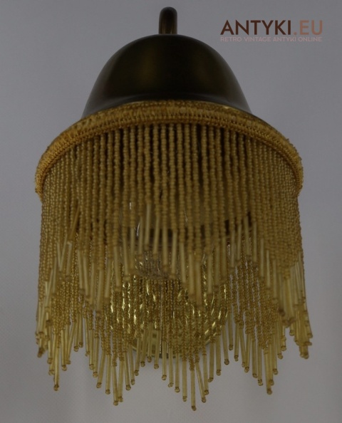 Klimatyczny kinkiet vintage do sypialni