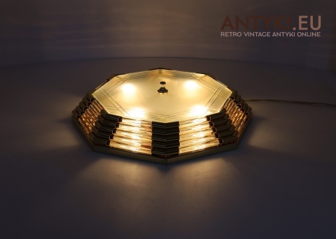 art deco złocony plafon art deco z geometrycznym wzorem
