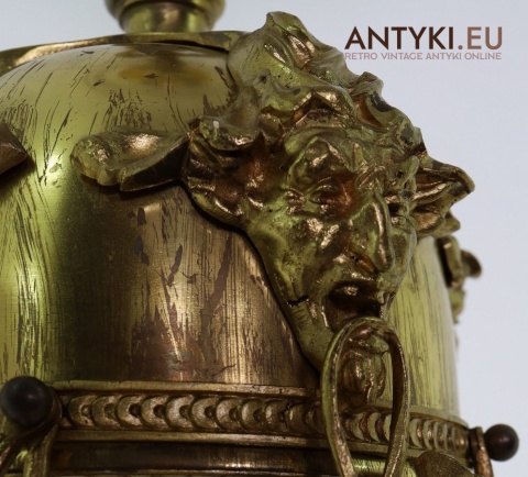 vintage lampa secesyjna z maszkaronem i motywem roślinnym