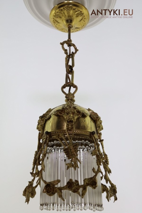 zabytkowa lampa retro z szklanym „kloszem” z rurek