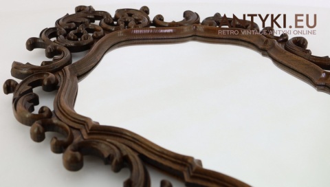 ścienne lustro retro z bogatą ornamentyką drewnianą