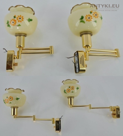 stare kinkiety obok łużka